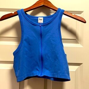 TNA blue crop zip tank